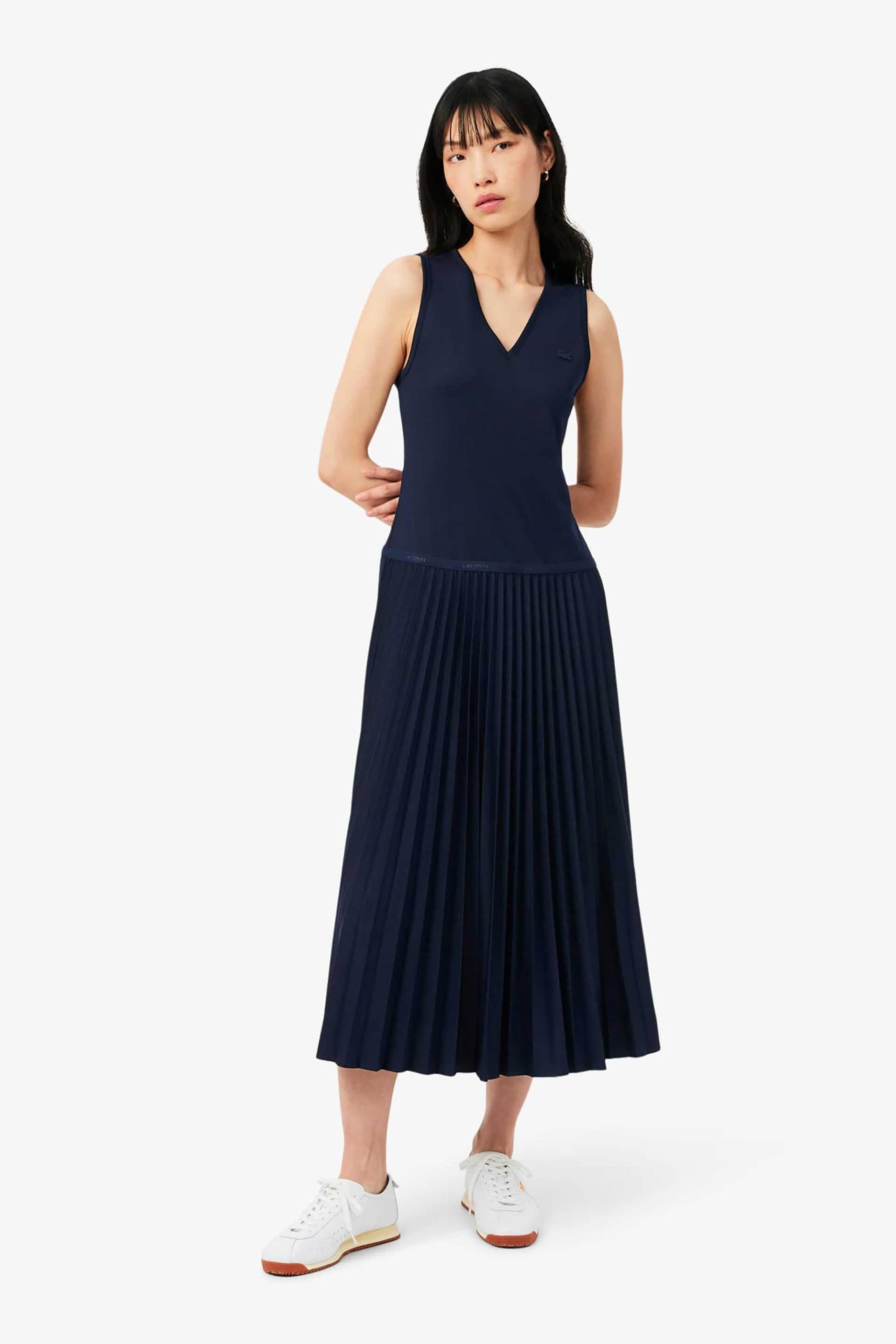 Lacoste γυναικείο midi φόρεμα αμάνικο με V και πλισέ φούστα Regular Fit