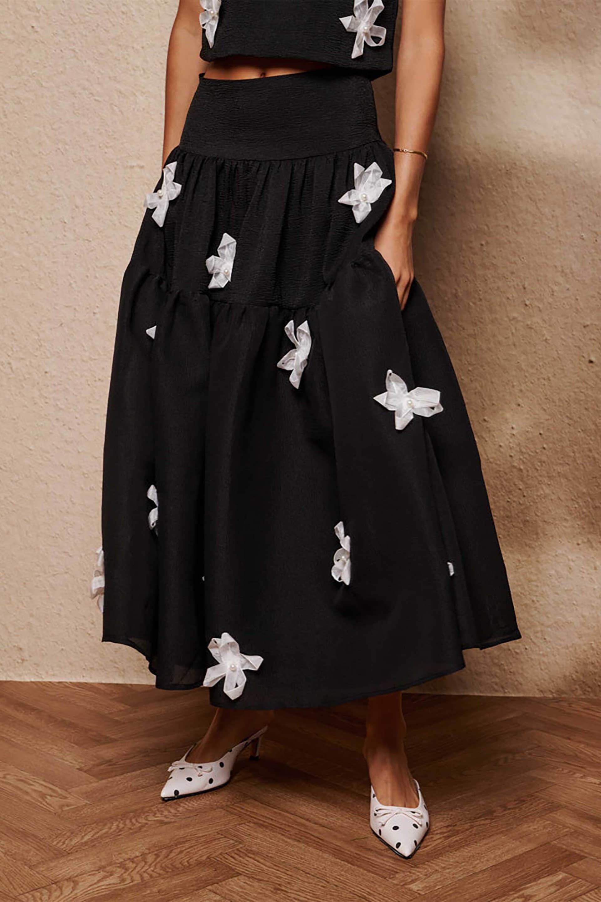 Sister Jane γυναικεία midi φούστα με απλικέ φιόγκους "Glow Flora"