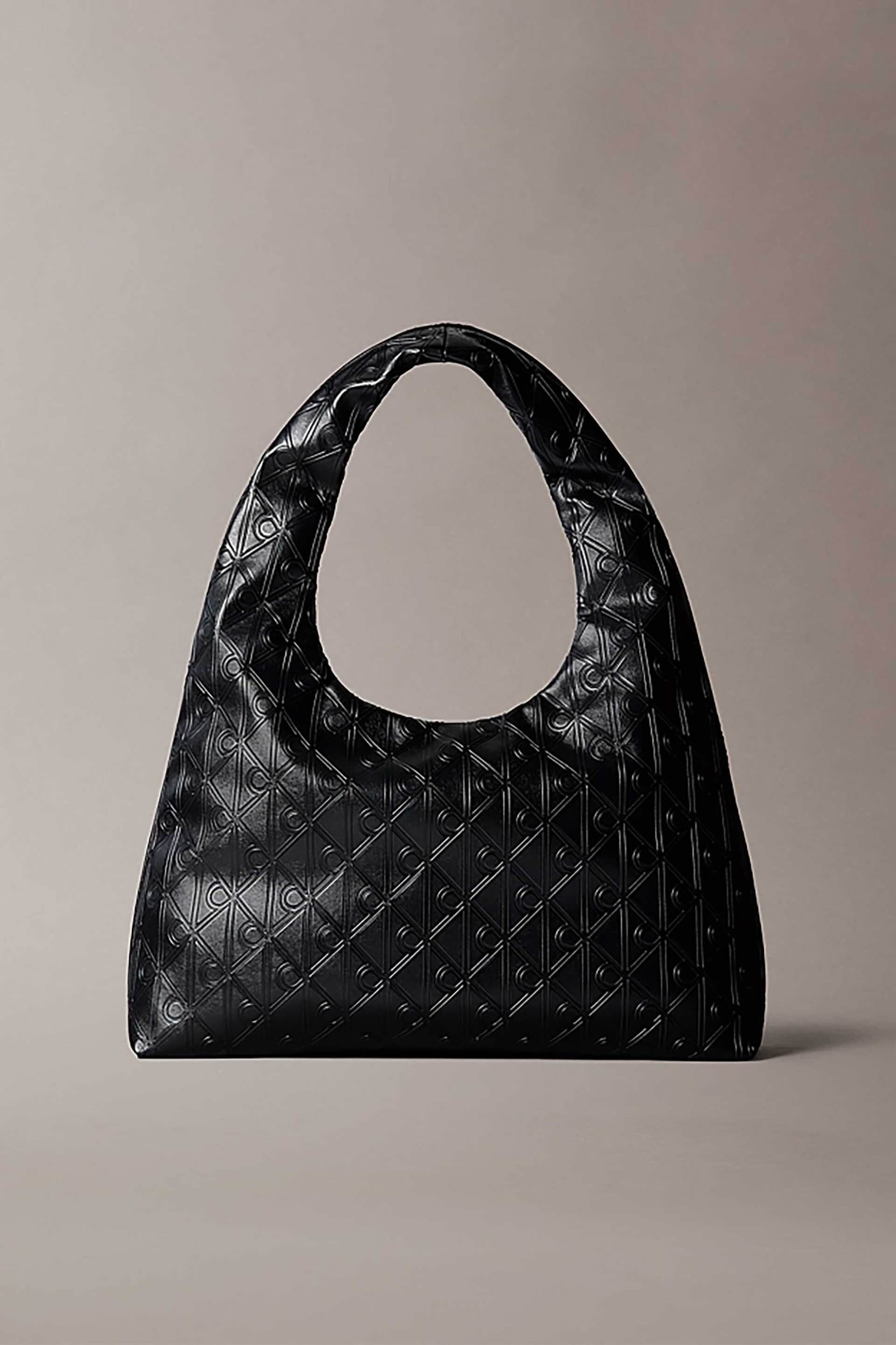 Calvin Klein Jeans γυναικεία τσάντα ώμου με all-over logo print | ONE SIZE